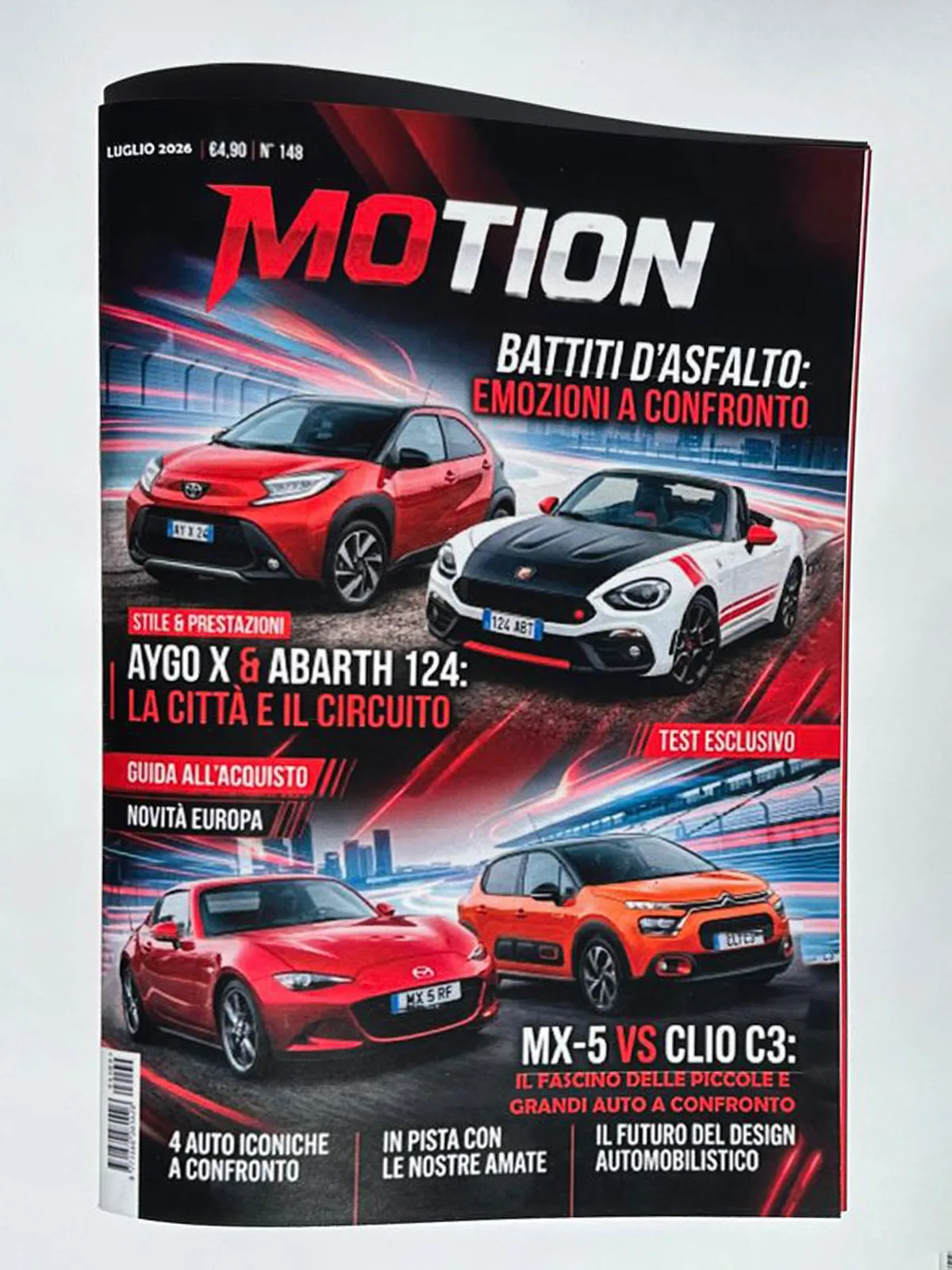 Copertina della rivista automobilistica MOTION stampata da GUUG Roma: magazine a colori su carta patinata con copertina lucida